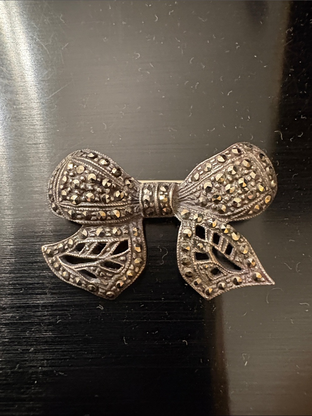Vintage-Inspired Silver Bow Brooch with Marcasite Accent
